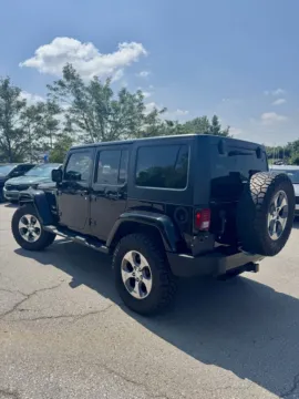 Another view of 2016 Jeep Wrangler Unlimited Sahara for sale in Lee's Summit, MO at Cable Dahmer Kia of Lee's Summit