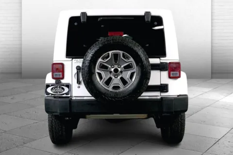 Another view of 2014 Jeep Wrangler Unlimited Rubicon for sale in Lee's Summit, MO at Cable Dahmer Kia of Lee's Summit