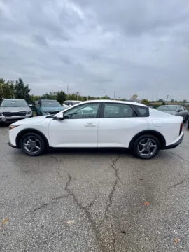 Photos of 2025 Kia K4 LXS for sale in Lee's Summit, MO at Cable Dahmer Kia of Lee's Summit
