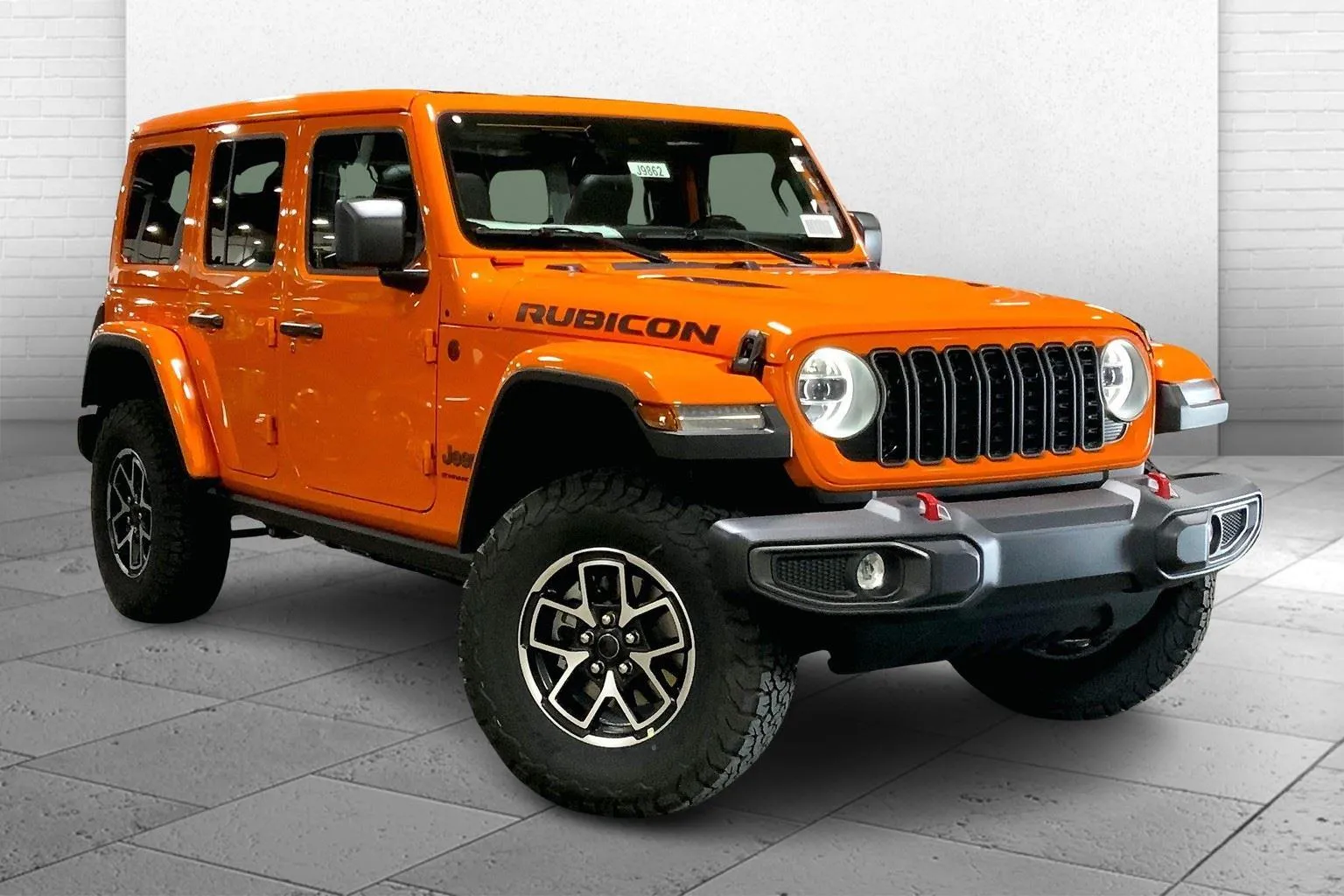 Orange 2025 Jeep Wrangler Rubicon for sale in Kansas City, MO