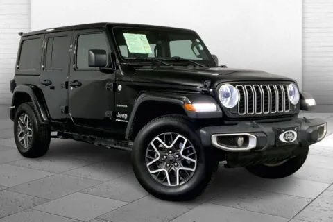 Black 2024 Jeep Wrangler 4-Door Sahara 4x4 for sale in Kansas City, MO