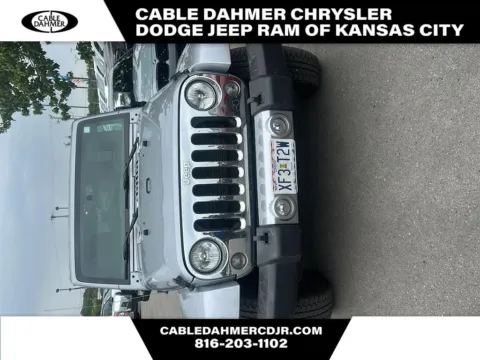 Silver 2016 Jeep Wrangler Unlimited Sahara for sale in Kansas City, MO