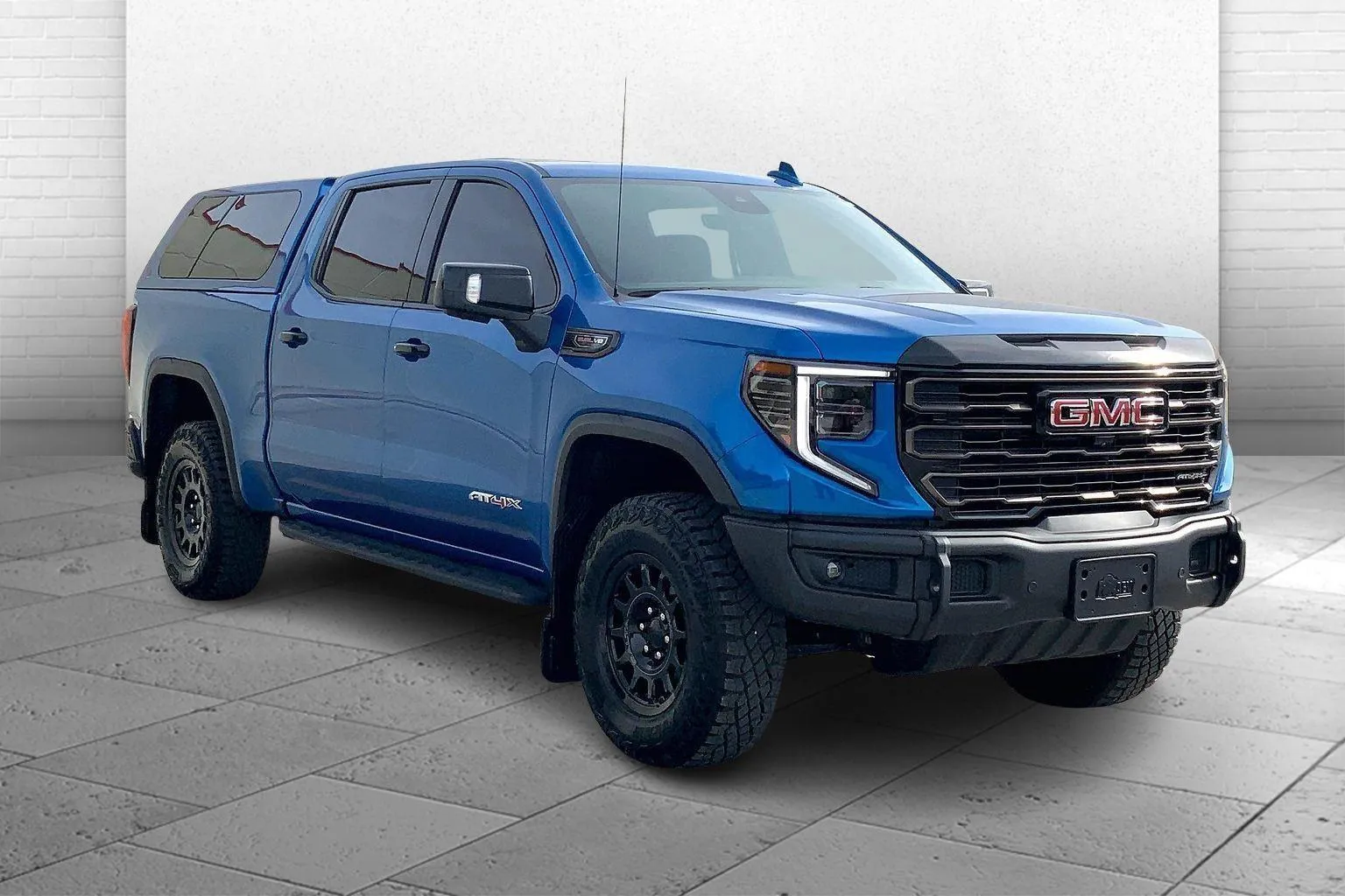 Blue 2023 GMC Sierra 1500 4WD Crew Cab Short Box AT4X for sale in Kansas City, MO