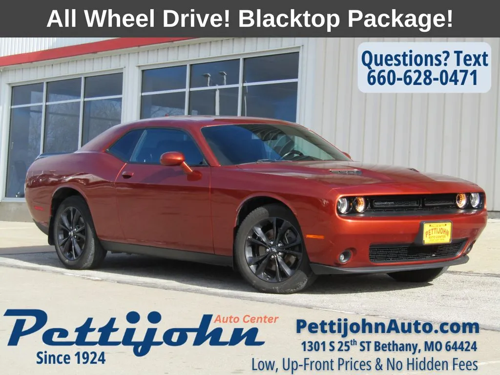 Used 2021 Dodge Challenger SXT with VIN 2C3CDZGG0MH508452 for sale in Kansas City