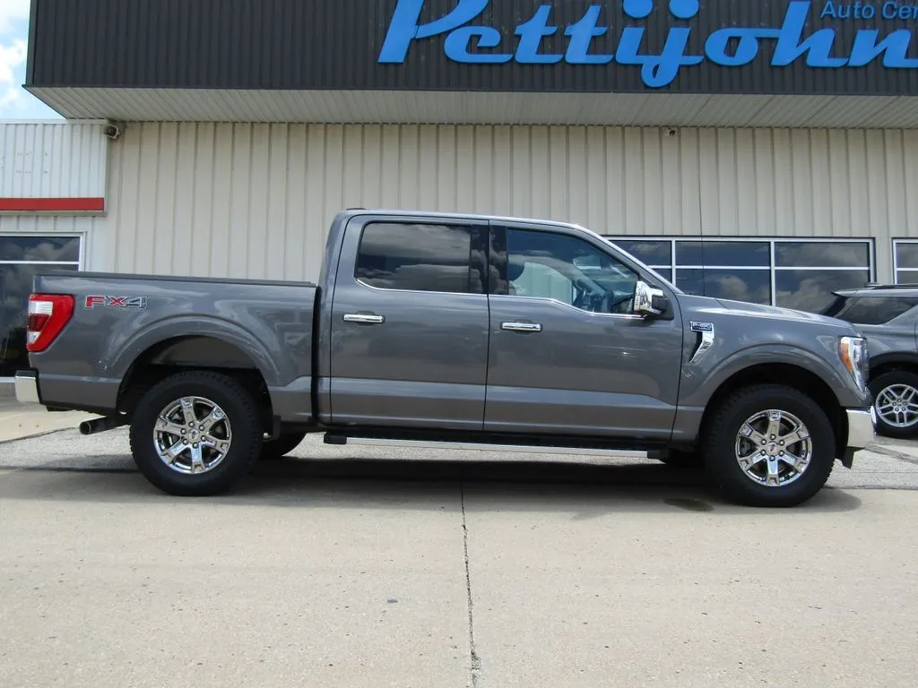 Used 2021 Ford F-150 Lariat with VIN 1FTFW1E51MKD98624 for sale in Kansas City