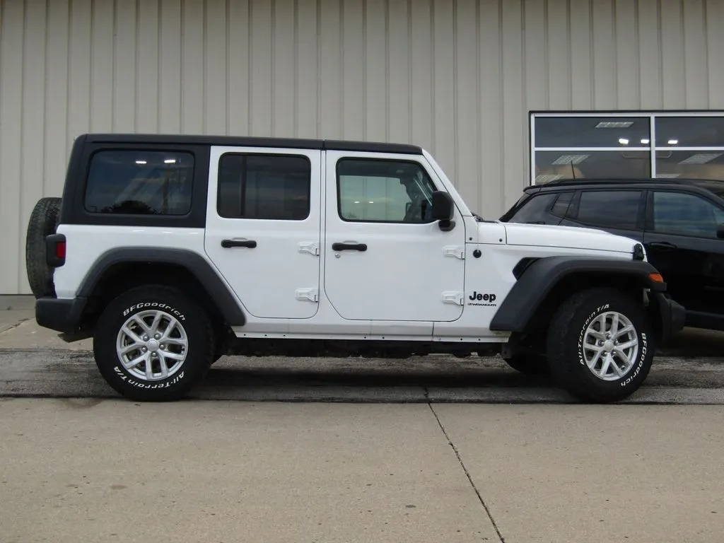 Used 2023 Jeep Wrangler 4-Door Sport RHD with VIN 1C4HJXKN4PW599168 for sale in Kansas City