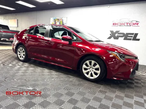 Red 2022 Toyota Corolla LE for sale in Las Vegas, NV
