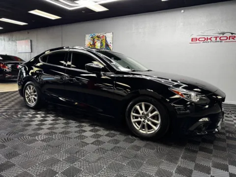 Black 2015 Mazda MAZDA3 i Grand Touring 4dr Sedan 6A for sale in Las Vegas, NV