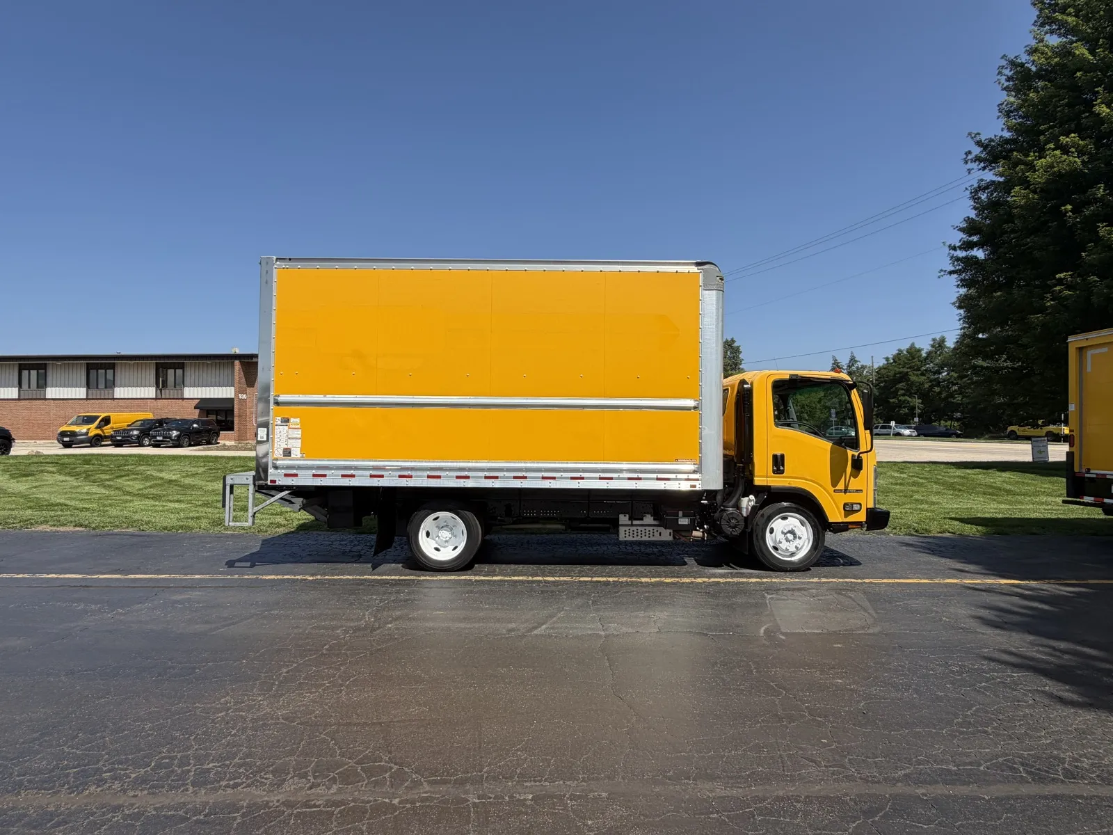Yellow 2021 Isuzu NPR HD 16 FT Box Truck with Liftgate for sale in Crystal Lake, IL