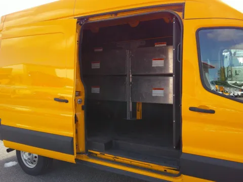 Another view of 2023 Ford AWD High Roof Transit Folding Shelves 250 for sale in Crystal Lake, IL at Signature Truck Center