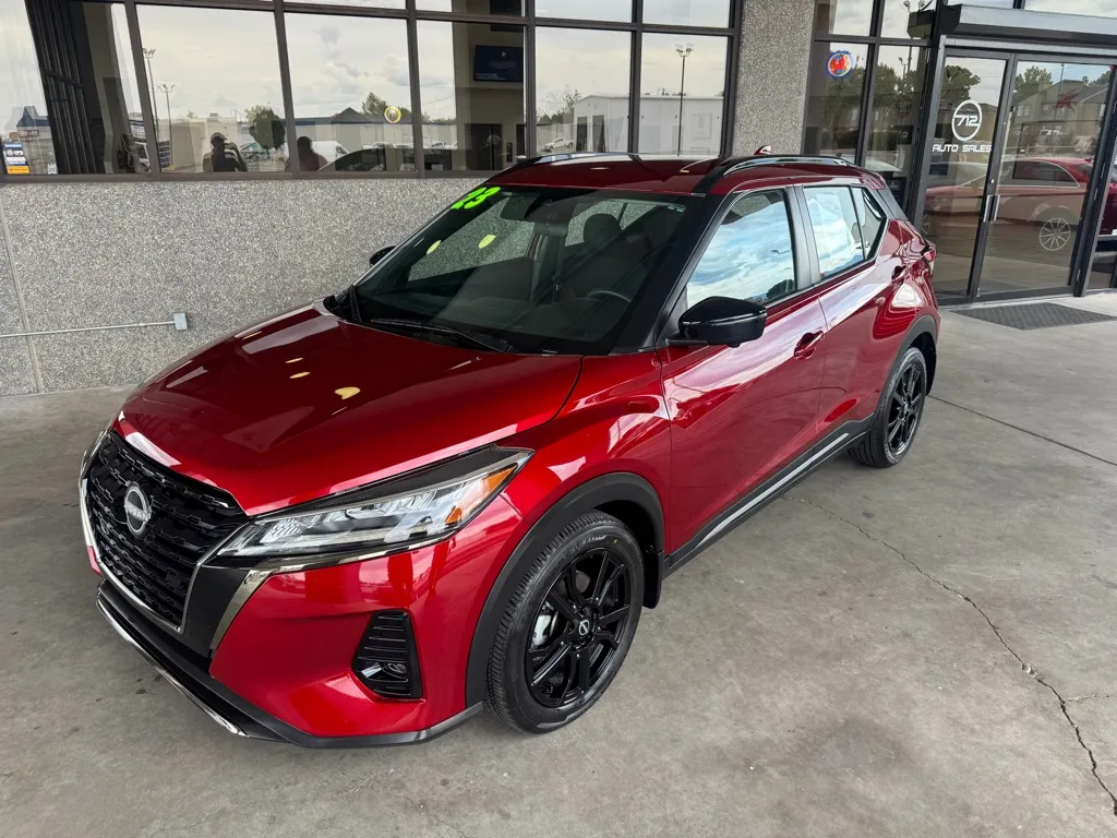 Red 2023 NISSAN KICKS SR for sale in Albuquerque, NM