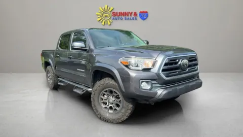 Gray 2018 Toyota Tacoma Double Cab SR5 Pickup 4D 5 ft for sale in Candler, NC