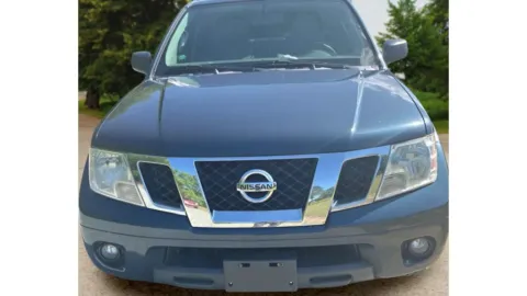 Another view of 2016 Nissan Frontier Crew Cab SV Pickup 4D 5 ft for sale in Candler, NC at Sunny and 70 Auto Sales