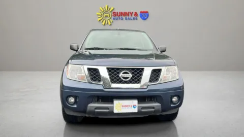 Another view of 2016 Nissan Frontier Crew Cab SV Pickup 4D 5 ft for sale in Candler, NC at Sunny and 70 Auto Sales