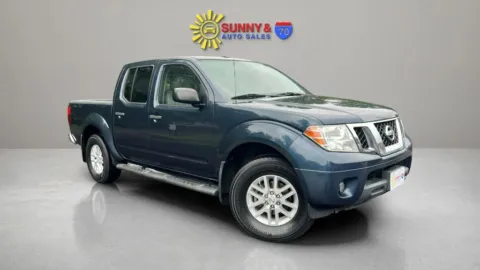 Blue 2016 Nissan Frontier Crew Cab SV Pickup 4D 5 ft for sale in Candler, NC