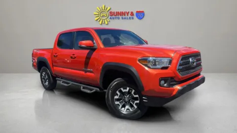 Orange 2017 Toyota Tacoma Double Cab TRD Off-Road Pickup 4D 5 ft for sale in Candler, NC