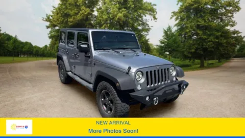 Silver 2013 Jeep Wrangler Unlimited Sport SUV 4D for sale in Candler, NC
