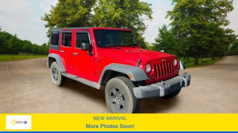 Red 2015 Jeep Wrangler Unlimited Sport SUV 4D for sale in Candler, NC