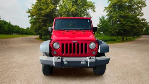 Another view of 2015 Jeep Wrangler Unlimited Sport SUV 4D for sale in Candler, NC at Sunny and 70 Auto Sales