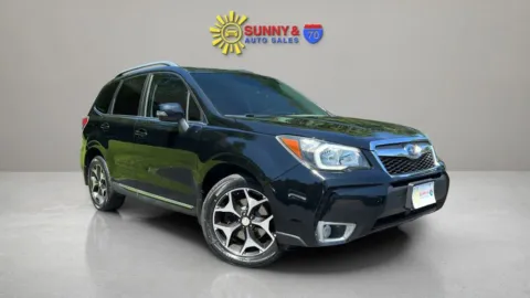 Black 2015 Subaru Forester 2.0XT Touring Sport Utility 4D for sale in Candler, NC