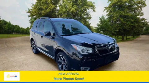 Black 2015 Subaru Forester 2.0XT Touring Sport Utility 4D for sale in Candler, NC