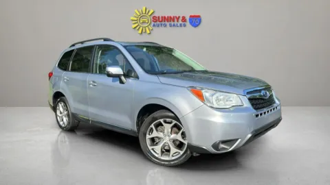 Silver 2016 Subaru Forester 2.5i Touring Sport Utility 4D for sale in Candler, NC