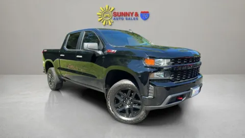 Black 2021 Chevrolet Silverado 1500 Crew Cab Custom Trail Boss Pickup 4D 5 3/4 ft for sale in Candler, NC
