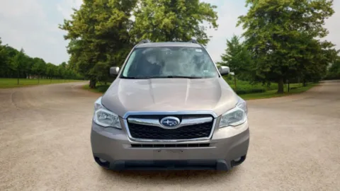 Photos of 2015 Subaru Forester 2.5i Touring Sport Utility 4D for sale in Candler, NC at Sunny and 70 Auto Sales