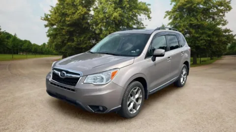 Another view of 2015 Subaru Forester 2.5i Touring Sport Utility 4D for sale in Candler, NC at Sunny and 70 Auto Sales