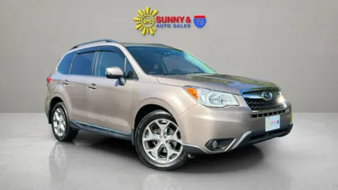 Brown 2015 Subaru Forester 2.5i Touring Sport Utility 4D for sale in Candler, NC