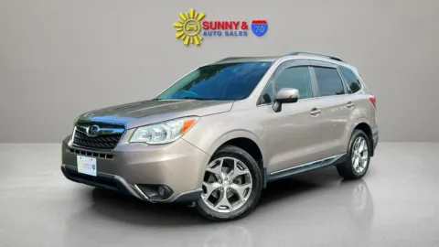 Another view of 2015 Subaru Forester 2.5i Touring Sport Utility 4D for sale in Candler, NC at Sunny and 70 Auto Sales
