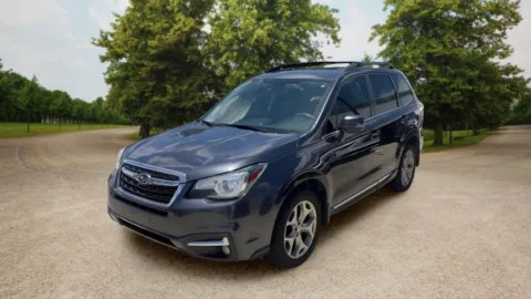 Another view of 2017 Subaru Forester 2.5i Touring Sport Utility 4D for sale in Candler, NC at Sunny and 70 Auto Sales