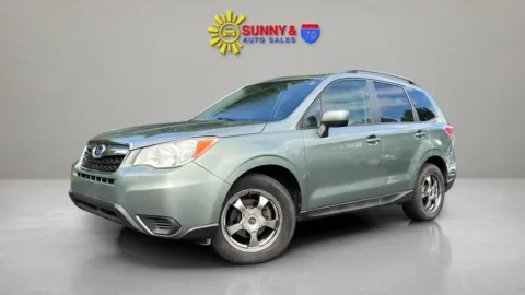 Another view of 2015 Subaru Forester 2.5i Premium Sport Utility 4D for sale in Candler, NC at Sunny and 70 Auto Sales