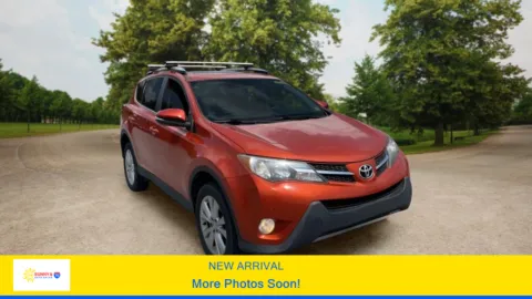 Orange 2015 Toyota RAV4 Limited Sport Utility 4D for sale in Candler, NC