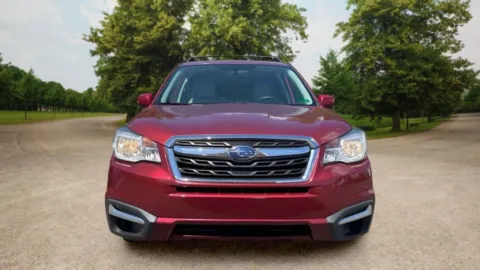 Photos of 2018 Subaru Forester 2.5i Premium Sport Utility 4D for sale in Candler, NC at Sunny and 70 Auto Sales