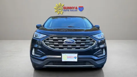 Photos of 2021 Ford Edge SEL Sport Utility 4D for sale in Candler, NC at Sunny and 70 Auto Sales