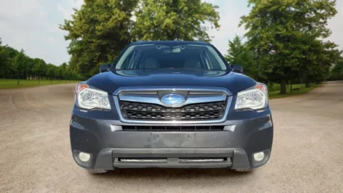 Photos of 2016 Subaru Forester 2.5i Touring Sport Utility 4D for sale in Candler, NC at Sunny and 70 Auto Sales