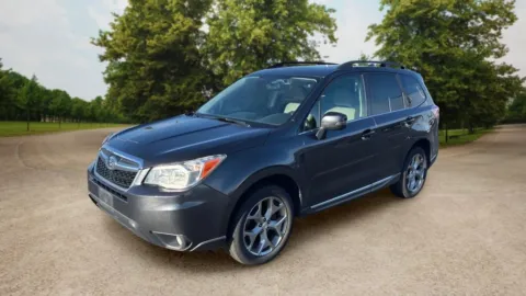 Another view of 2016 Subaru Forester 2.5i Touring Sport Utility 4D for sale in Candler, NC at Sunny and 70 Auto Sales