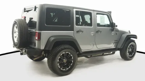 More photos of 2013 Jeep Wrangler Unlimited Sport at Auto City, CA