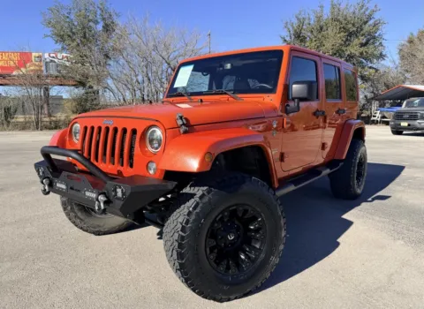 Orange 2015 Jeep Wrangler Unlimited Sahara for sale in Abilene, TX