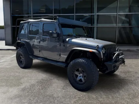 Gray 2016 Jeep Wrangler Unlimited Sport for sale in Knoxville, TN