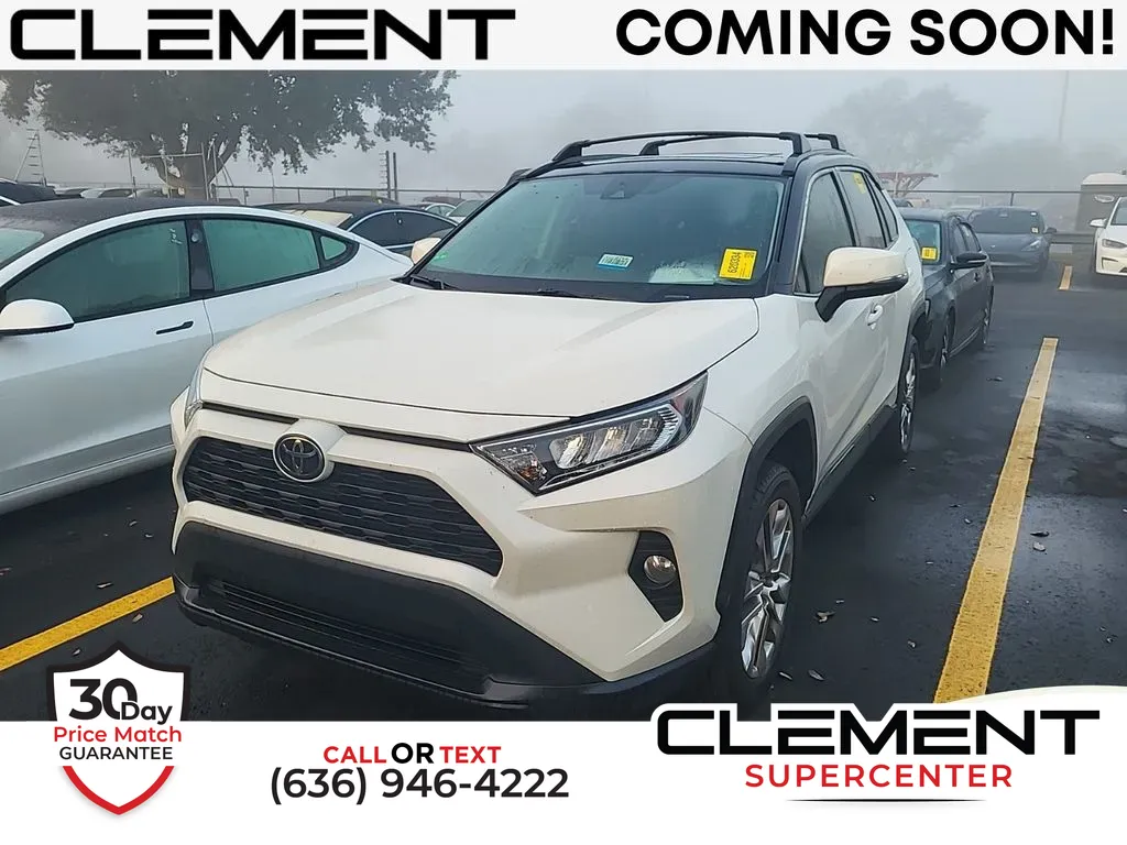 White 2021 Toyota RAV4 XLE Premium for sale in Saint Charles, MO