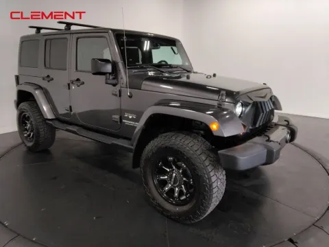 Another view of 2016 Jeep Wrangler Unlimited Sahara for sale in Saint Charles, MO at Clement Supercenter