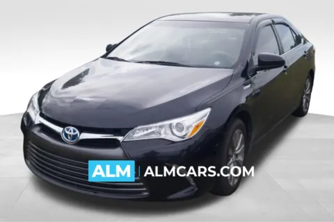 Beige 2017 Toyota Camry Hybrid LE for sale in Lumberton, NC