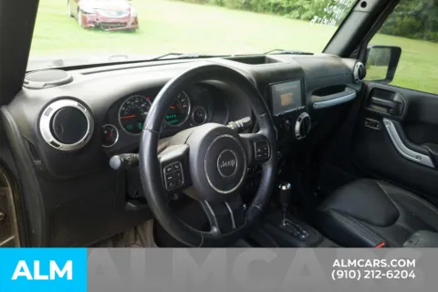 More photos of 2016 Jeep Wrangler Unlimited Sahara at ALM Hyundai Lumberton, NC