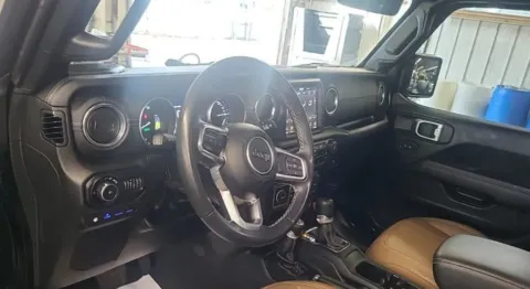 Photos of 2022 Jeep Wrangler Unlimited Sahara 4xe for sale in Columbus, OH at SAVVY AUTO SALES LLC