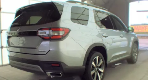 Another view of 2023 Honda Pilot Touring for sale in Columbus, OH at SAVVY AUTO SALES LLC