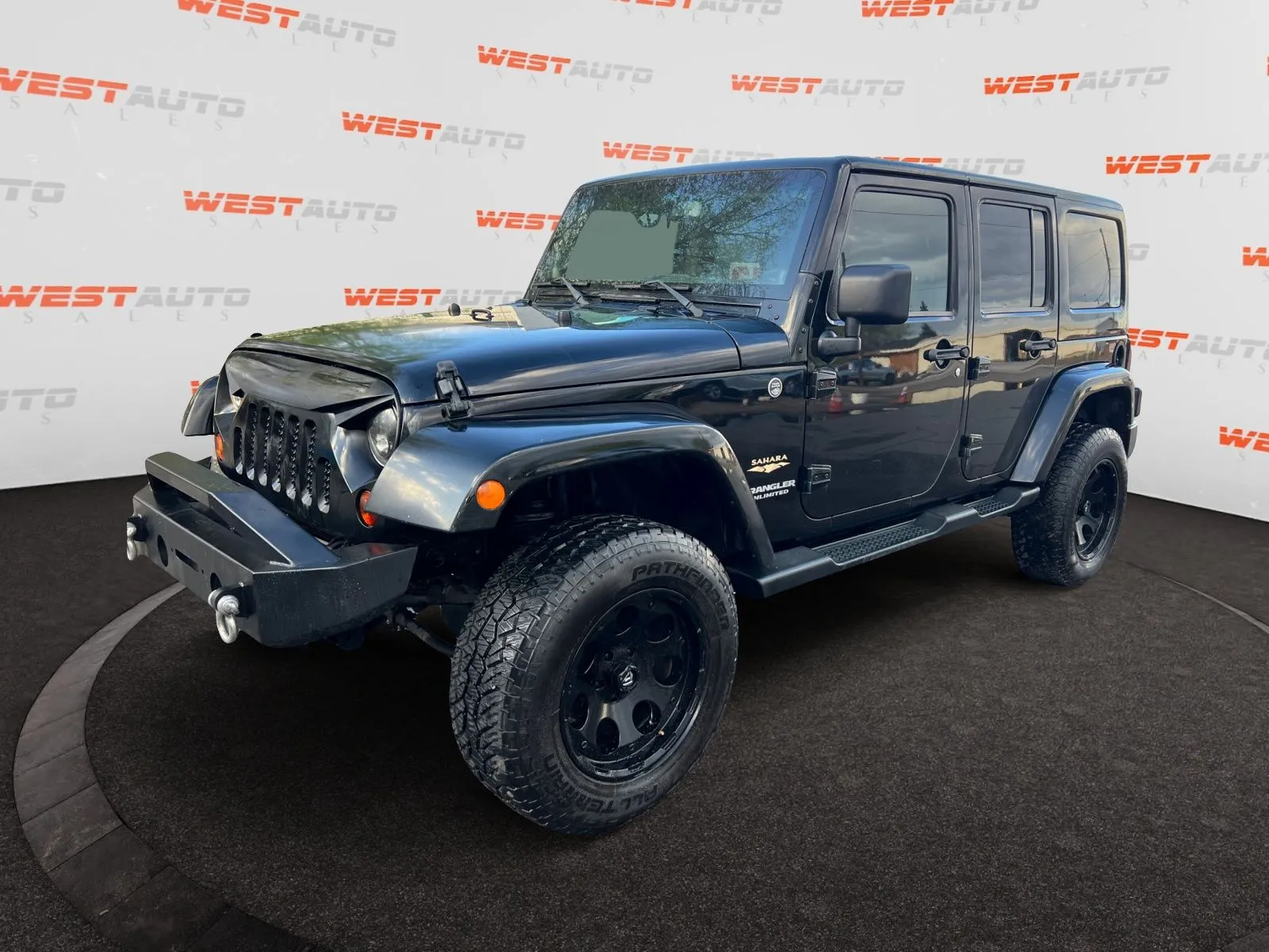 Black 2013 Jeep Wrangler Unlimited Sahara for sale in West Valley City, UT