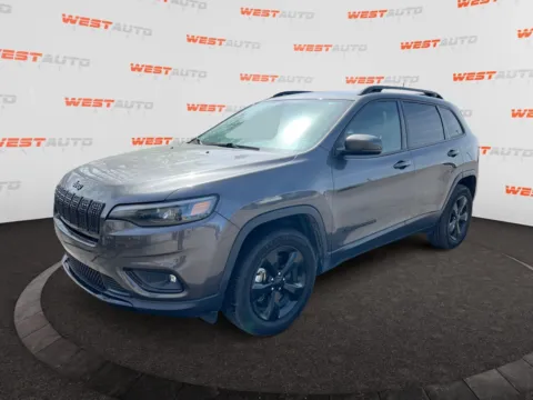 Gray 2019 Jeep Cherokee Altitude for sale in West Valley City, UT