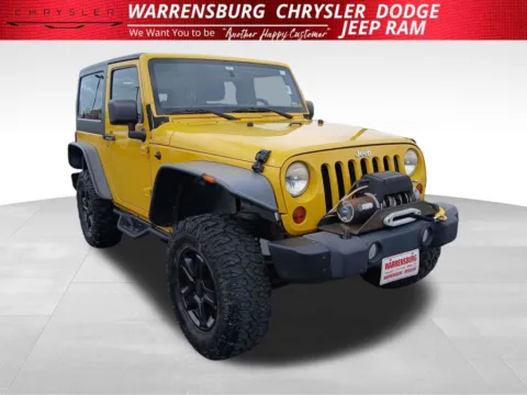 Yellow 2011 Jeep Wrangler Sport for sale in Warrensburg, MO
